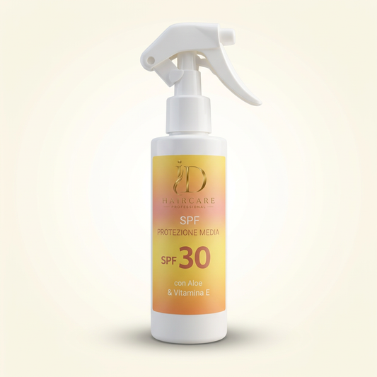Spray SPF 30 ID Hair Care Professional con Aloe e Vitamina E su sfondo chiaro